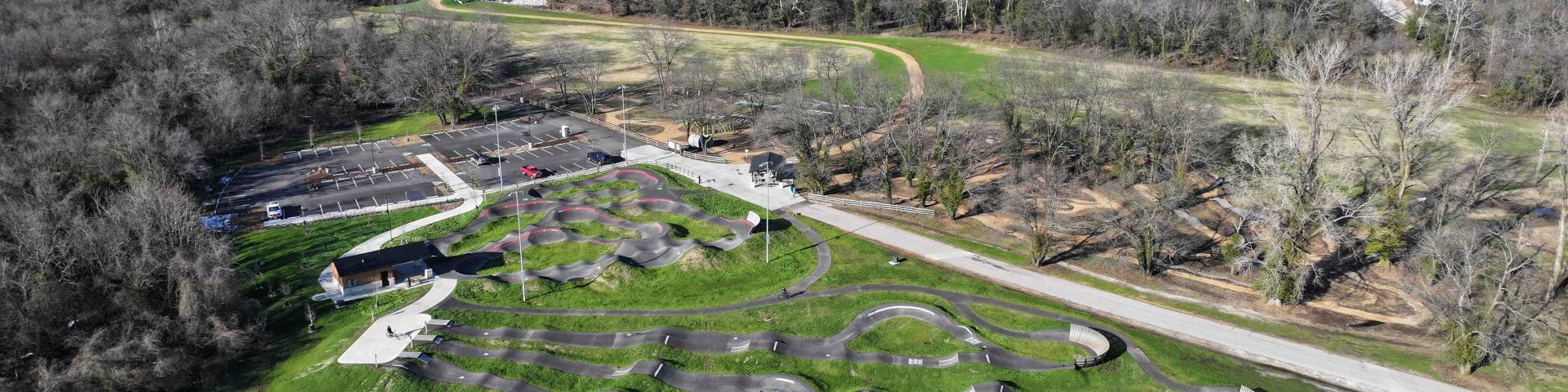 Aerial drone image looking down onto jump lines and other park features at MOmentum
